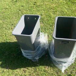2 Grey Trash cans 
