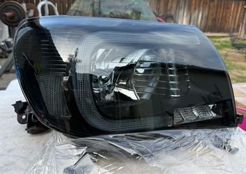 05-11 Toyota Tacoma Black Smoke LED Strip Signal Headlights