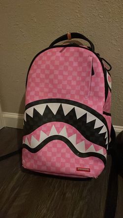 Pink and black spray ground backpack