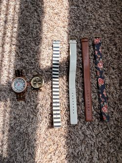 2 watches and multiple watch bands