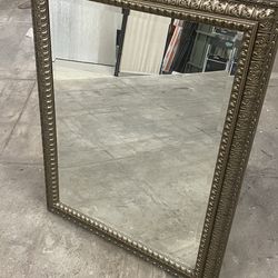 Ornate framed mirror