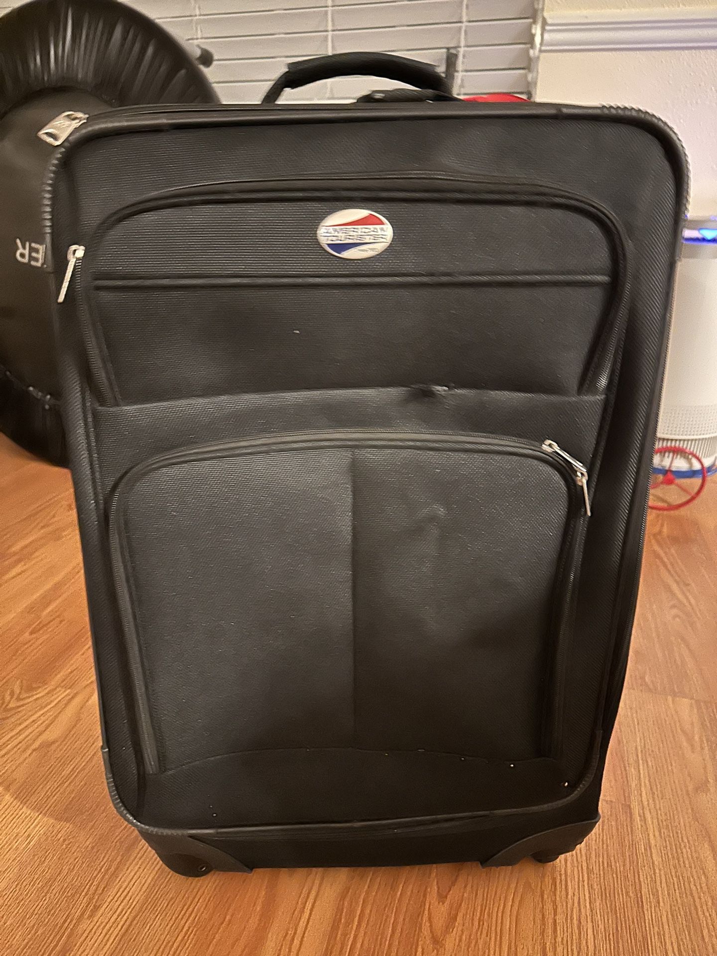2 Suitcases One Large Check Bag And One Carry On