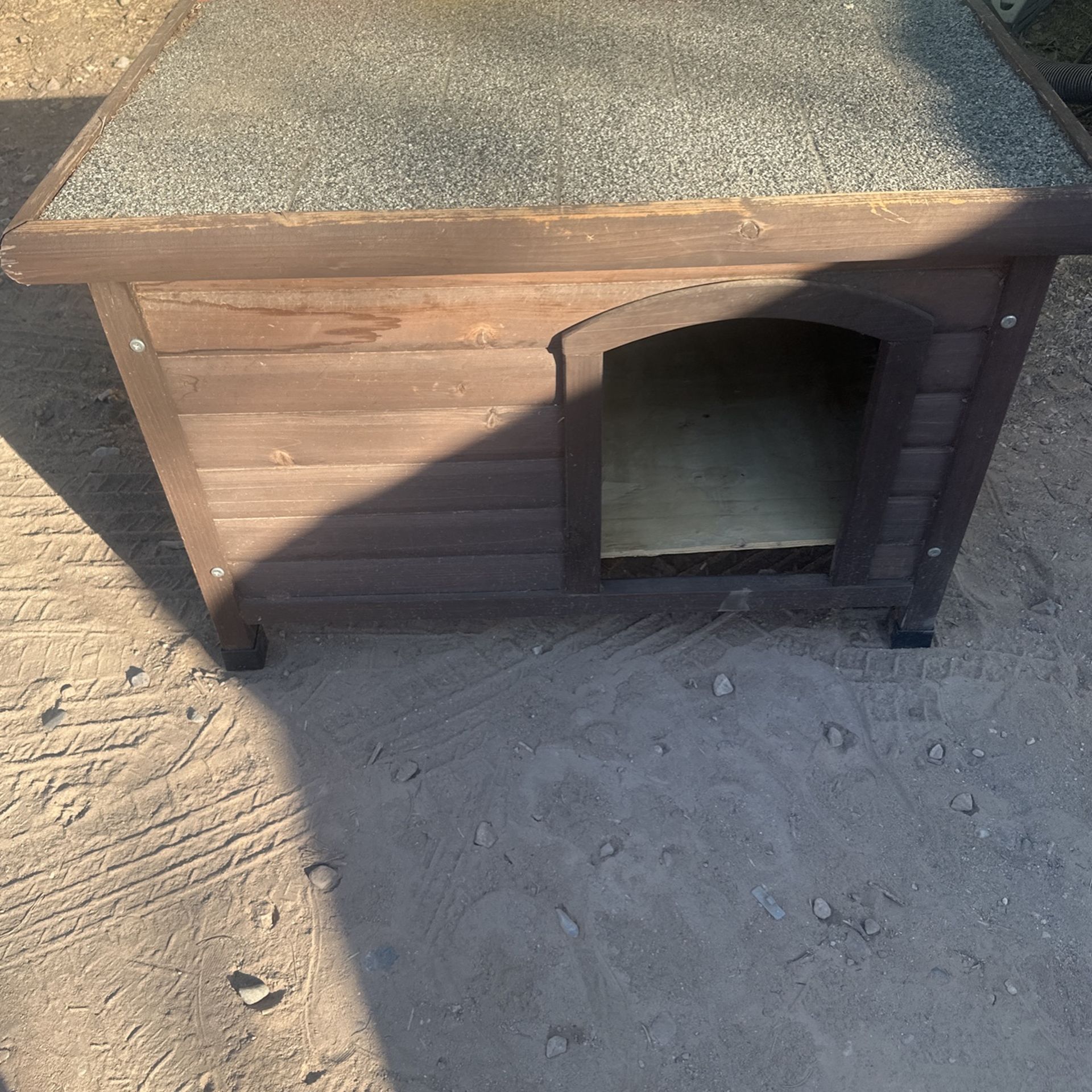 Doghouse/chicken coop 34 inches long by 23 inches wide and 22 inches high