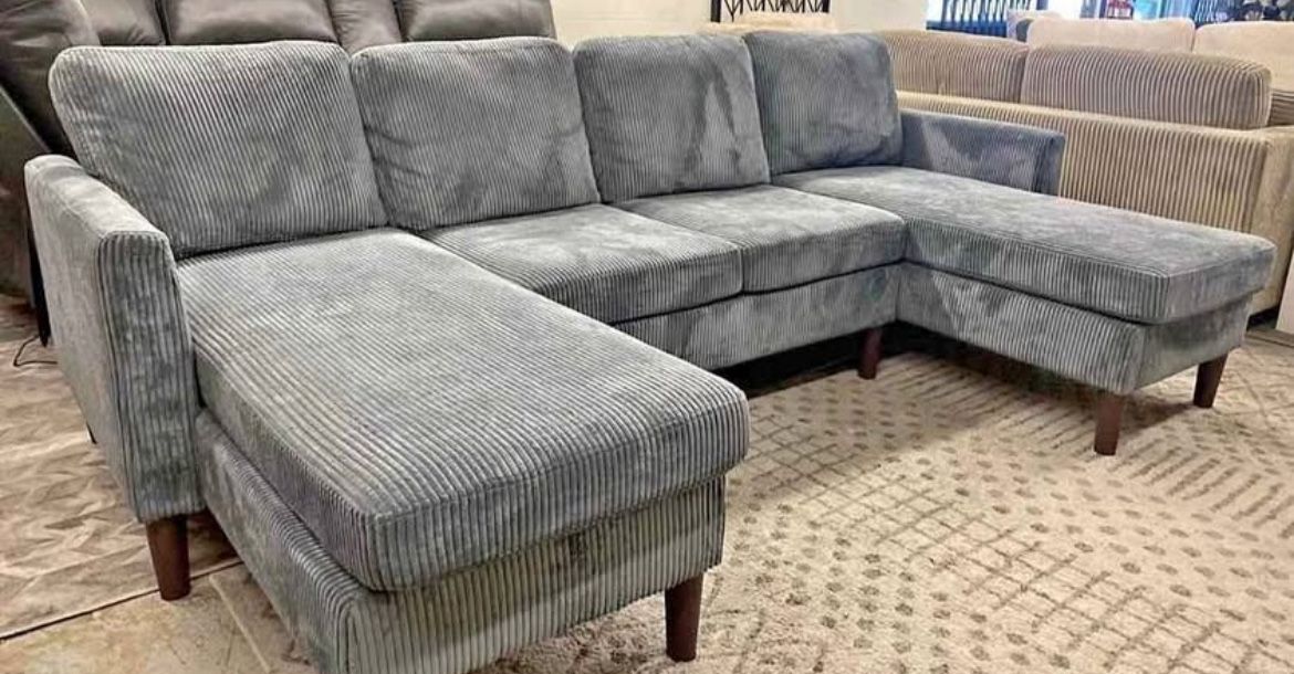 new grey corduroy Sectional Sofa with two chaises.