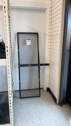 black steel hitch-mounted cargo carrier