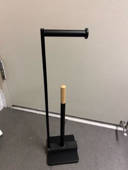 Toilet paper holder with stand like new!
