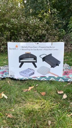 Bertello Pizza oven with propane burner, wood tray for gas burner this is a Pizza peel combo.