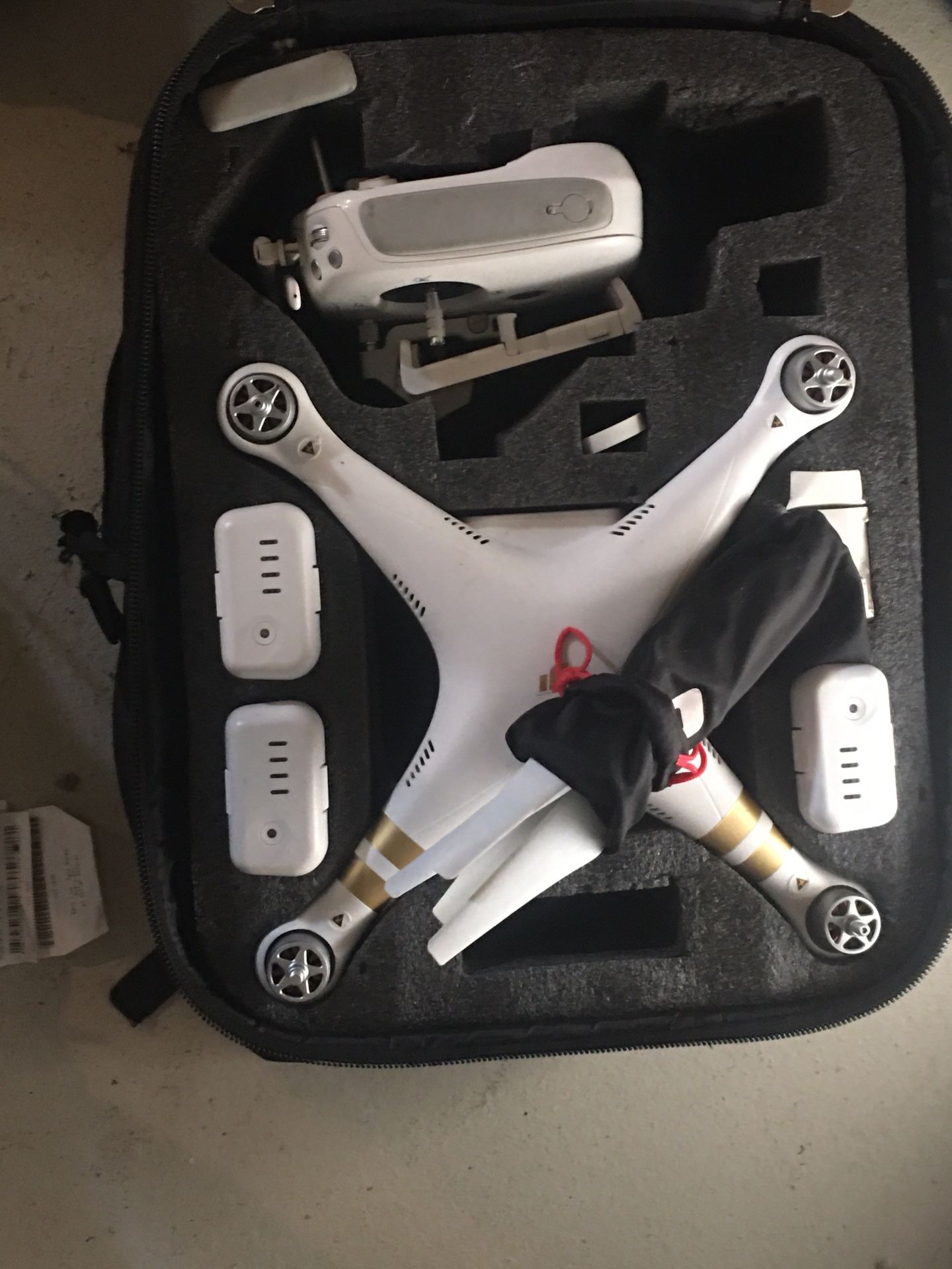 DJI PHANTOM III Drone, used but in fine working condition. Comes with propeller removal tool, charger charges the drone batteries and the controller