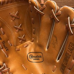 Vintage Carnation Dodgers promotional Baseball Glove Autographed by Steve Garvey and Bill Russell.