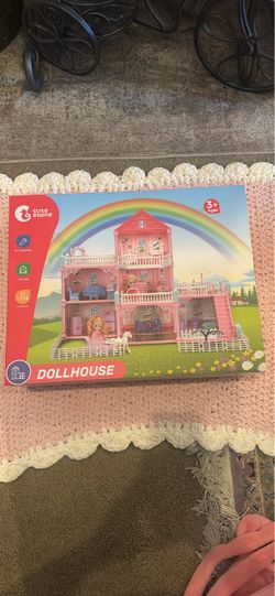 New in box doll house