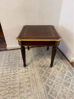 Refinished wooden end table with gold leaf accents