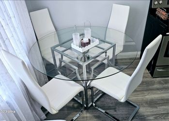 Excellent condition set dining room, round table 54" plus silver metal base plus 4 flawless white chairs, delivery available!
