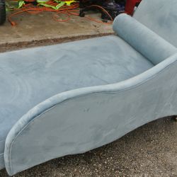 Powder blue chaise with rolled pillow