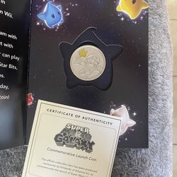 Official Nintendo Wii Super Mario Galaxy Commemorative Launch Coin W/COA 2007 with certificate of authenticity. 