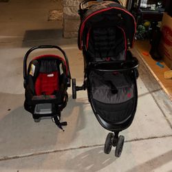 red and black car seat/stroller.