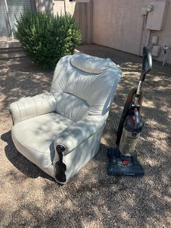 White Leather Recliner Chair & commercial vacuum cleaner