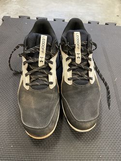 $50 each Rubber Baseball Cleats (Black 10.5, White 12)
