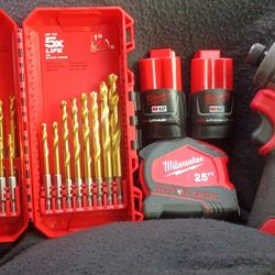 Makita Drill Two Batteries Measuring Tape And Drill Bits Brand New