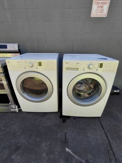 Pair of LG brand washing machines, used, gas-powered