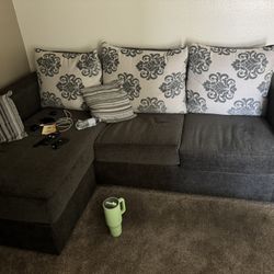 Couch And A Bed With The Mattress 
