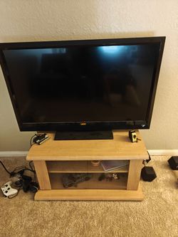 50" 1080P TV + Stand/Cabinet