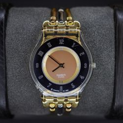 Vintage Swatch Swiss Quartz Transparent Gold Tone Black Dial Ladies Watch Runs