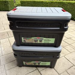 (2) Rubbermaid Roughneck storage containers, each 35 gallons, with secure latching lids. Heavy-duty plastic — great for garage, attic, holiday 
