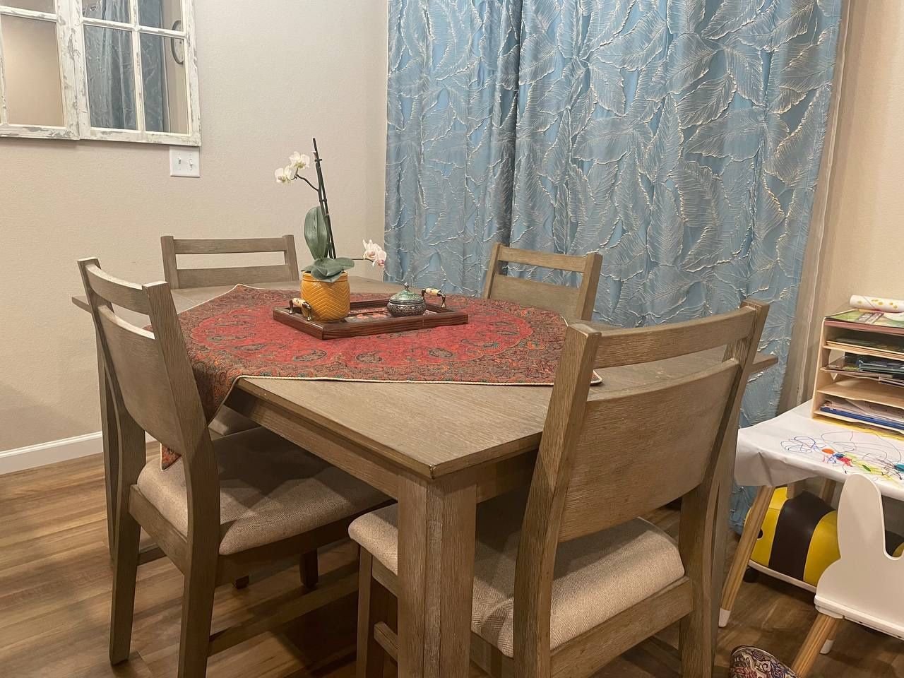 Four-person oak dining table from Furniture Row