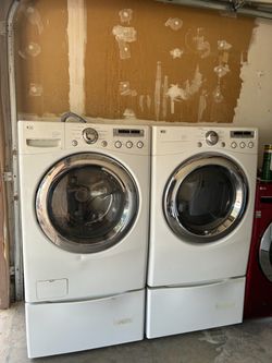 LG Front-Load Washer and Dryer Set with Pedestals