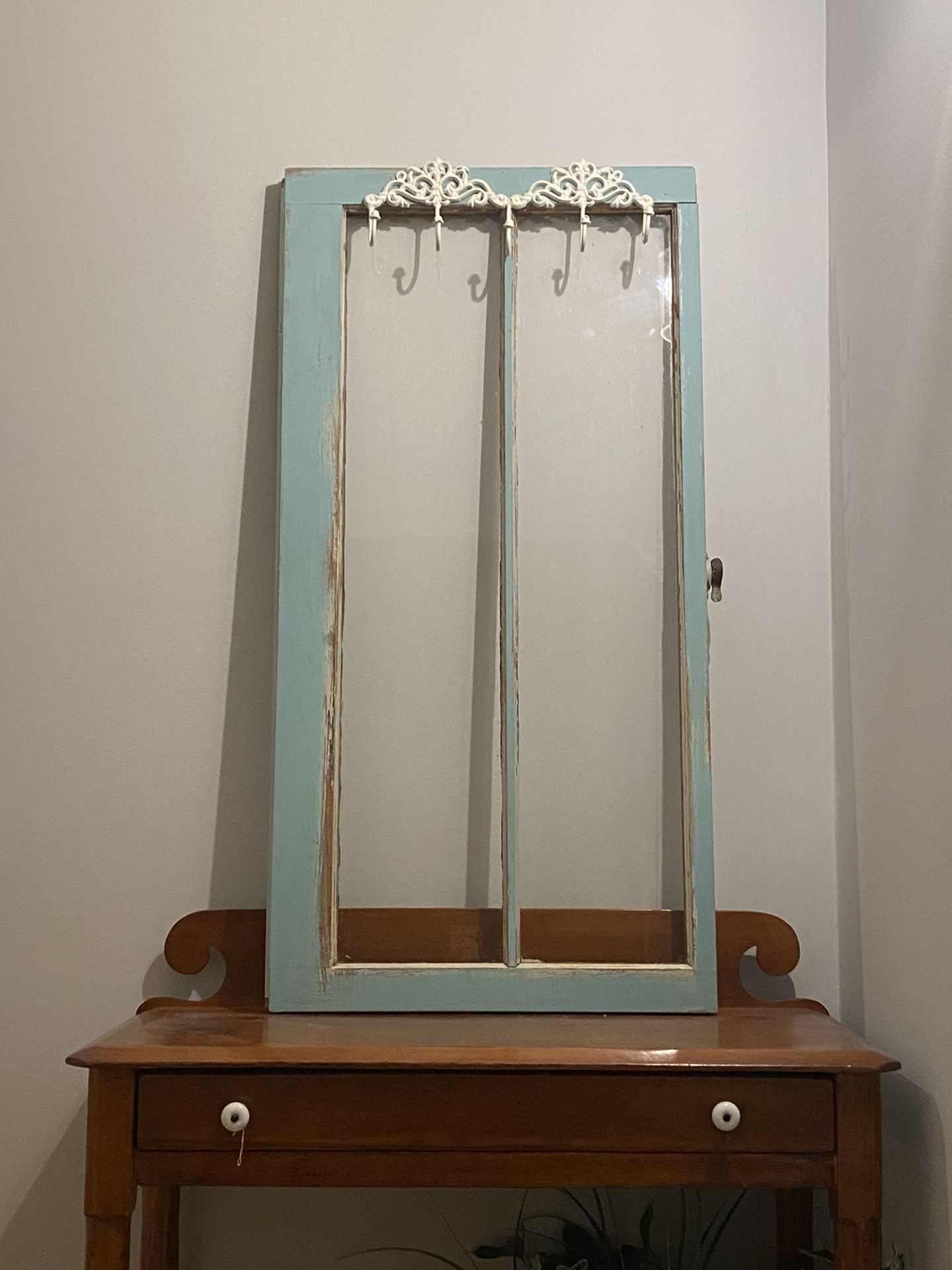 Old window with hooks