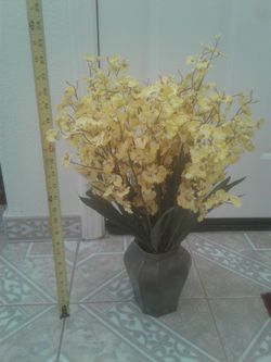 Artificial flowers in metal pot. Asking $10