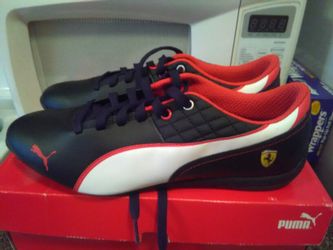 Leather pumas new in box size 11