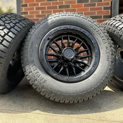 20” black Krawler wheels Dodge Ram 2500 8x6.5 35” all terrain tires 35x12.50r20 Lock Off Road 8 lug