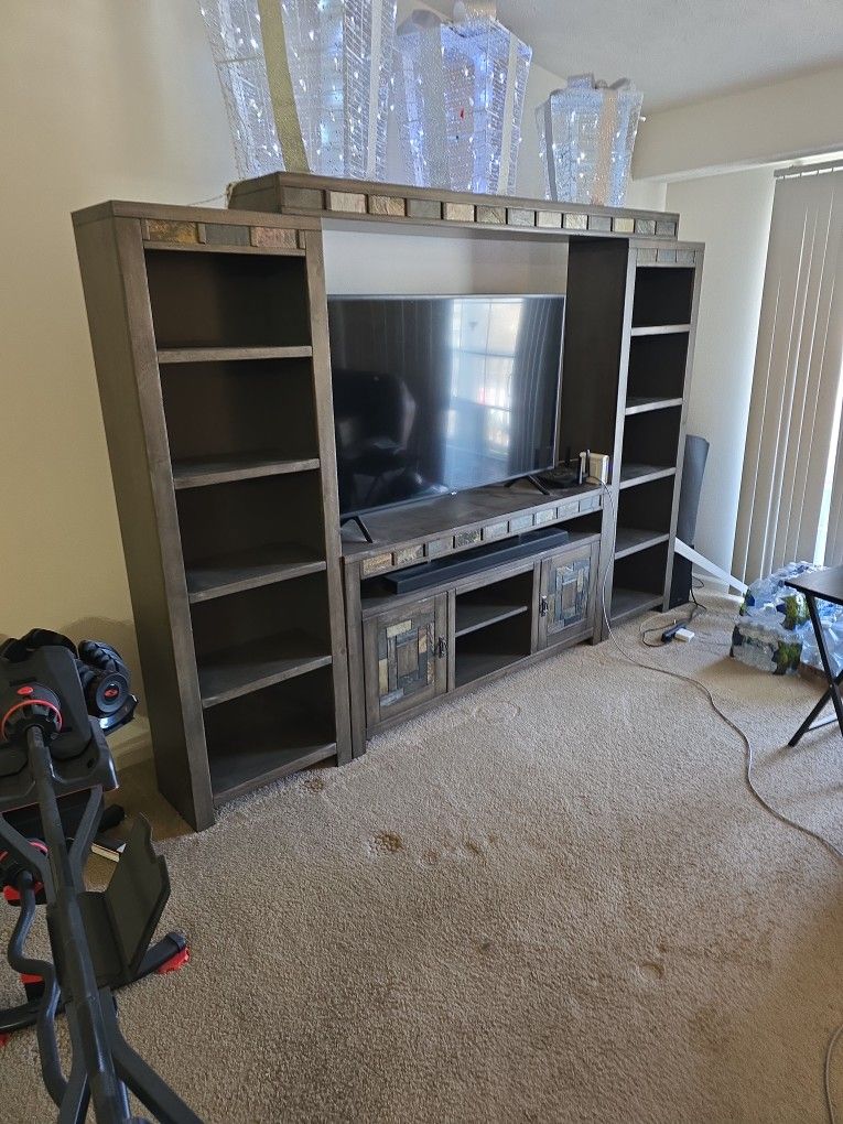 Need Gone Today 55 Inch TV, Entertainment Center, Soundbar W/ Subwoofer