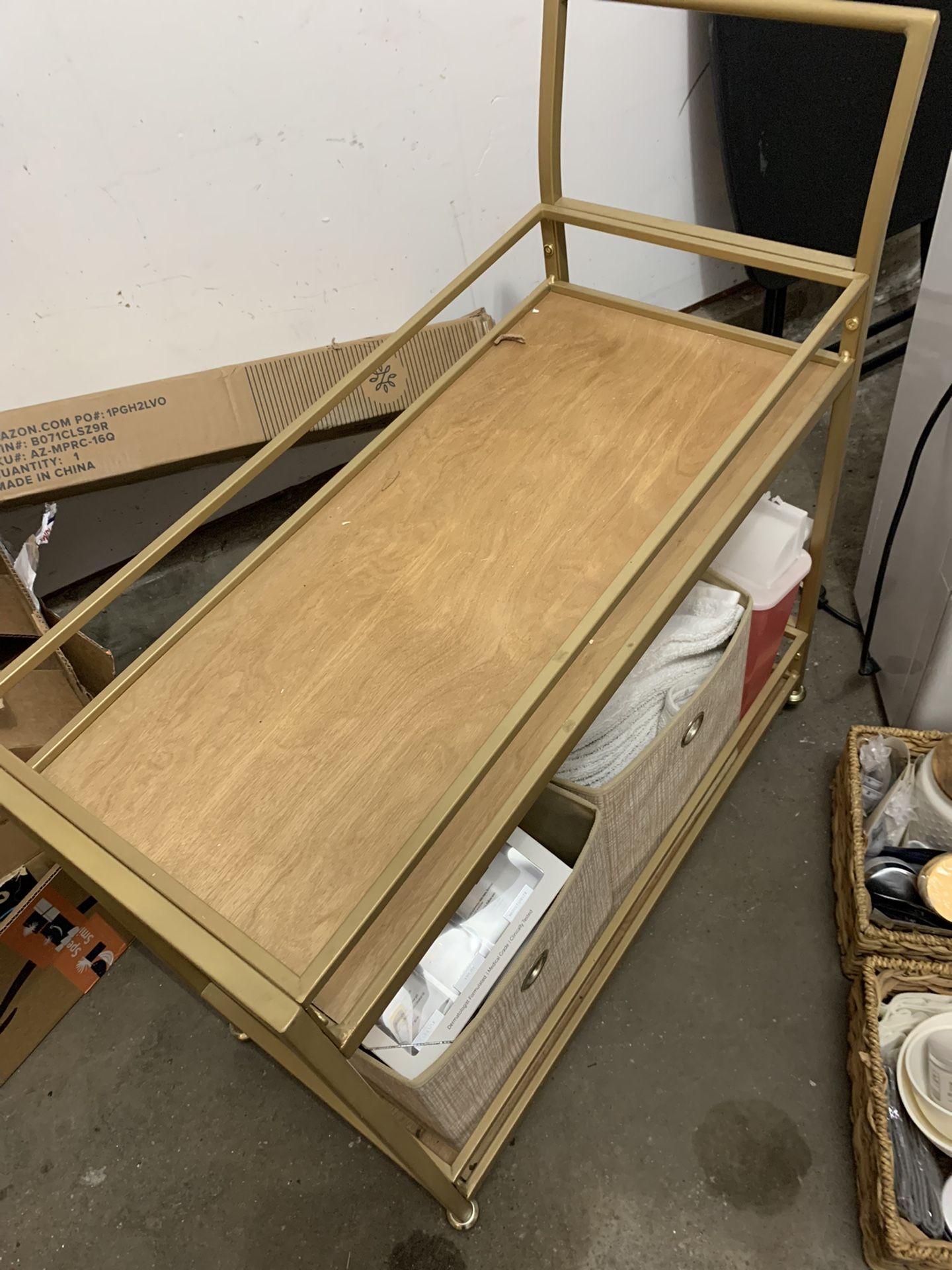 Gold and Wood Aesthetician cart for products