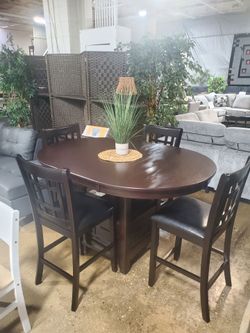 5 pc oval that turns into circle dining set (NEW)