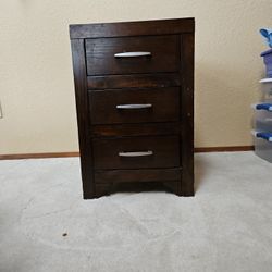 Three Drawer Brown Wood Nightstand 