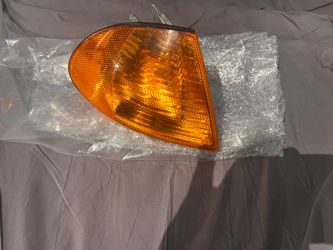 Oem E46 sedan right corner headlight