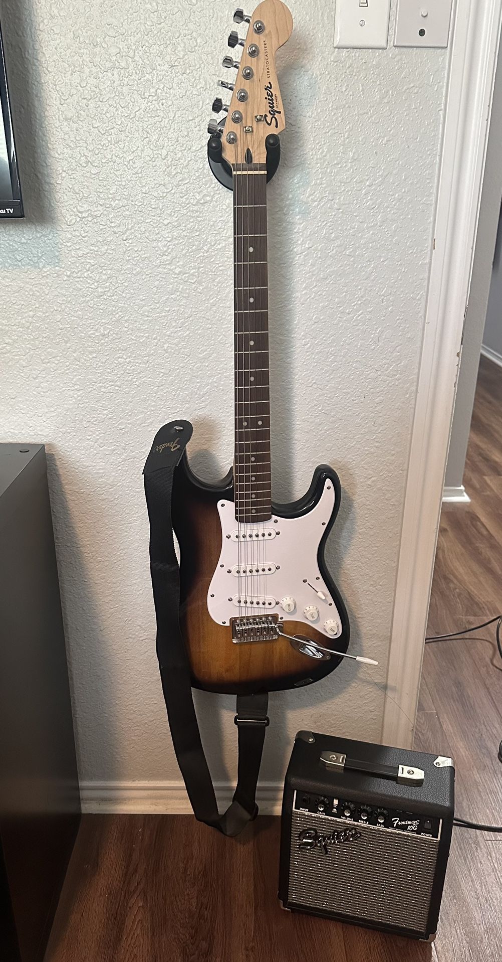Squier Strat Electric Guitar + Amp + Case + Wall Mount– Barely Used!