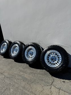 New KMC KM552 IMS 8x6.5 18" Wheels Machined With 275/70r18 Mickey Thompson Baja Boss A/T Tires
