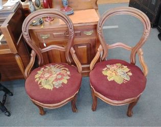Antique carved needlepoint chairs