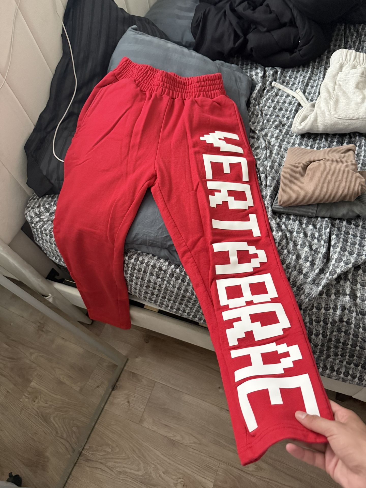 Designer pants or sweats Vertabrae