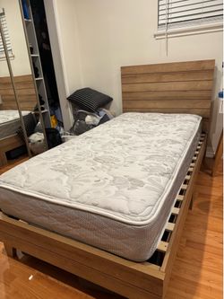 Twin bed frame with mattress