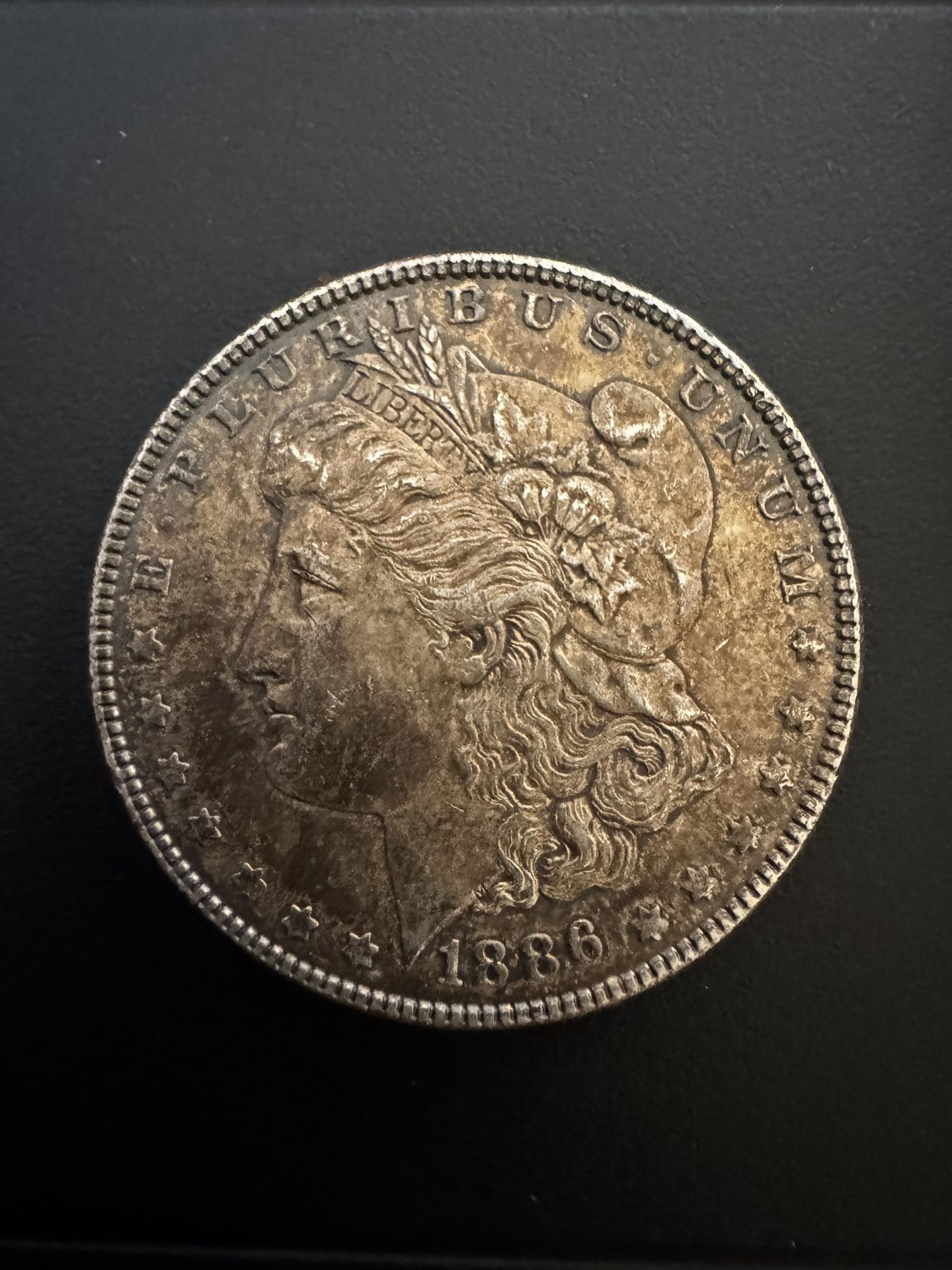 1886 no mint mark Morgan Silver Dollar