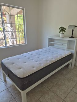 Twin bed frame with mattress