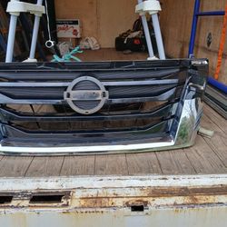 Nissan Pathfinder grill assembly $60