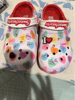 Sweetheart collection crocs, women size 8, men’s size 6 with charms Sweetheart collection crocs, women size 8, men’s size 6 with charms