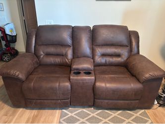 Dual electric reclining loveseat
