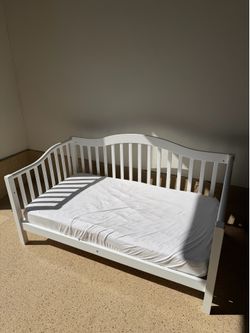Toddler bed and mattress