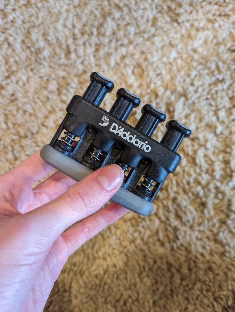 Guitar finger trainer